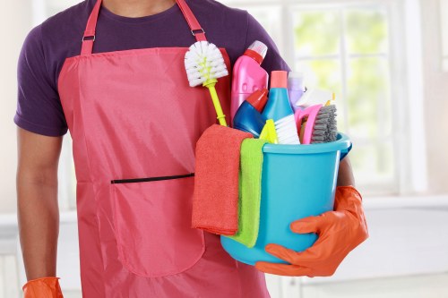 Professional carpet cleaning team following a safe working process